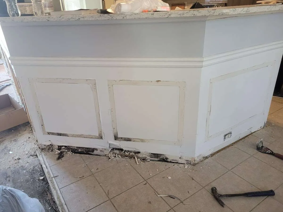 Water damage and mold on kitchen during Storm Damage Restoration in Peru